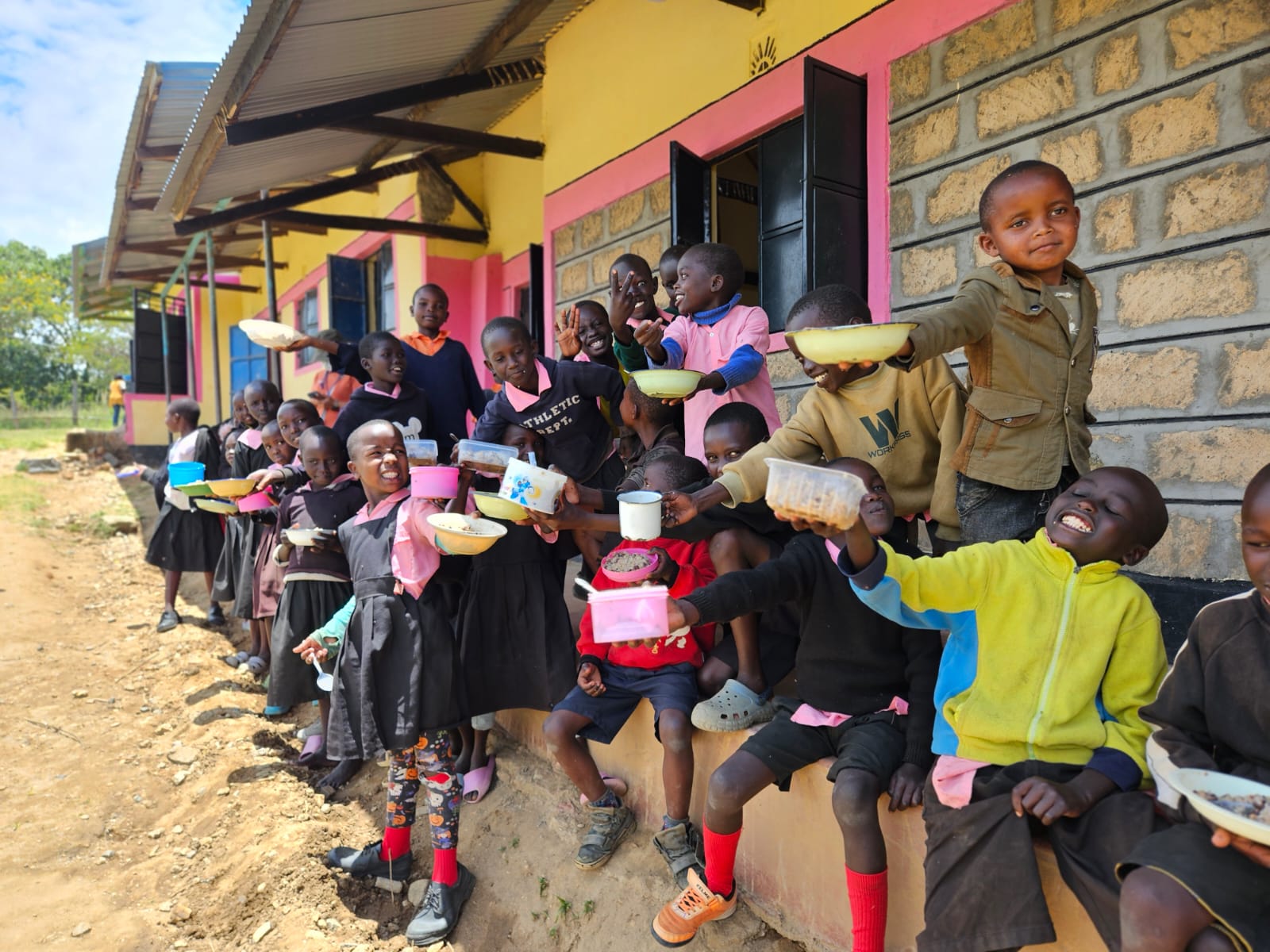 Children receiving morning meal — Kapenguria Primary